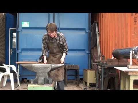 (Watch in HD) forging a railroad spike... Watch video to find out what.