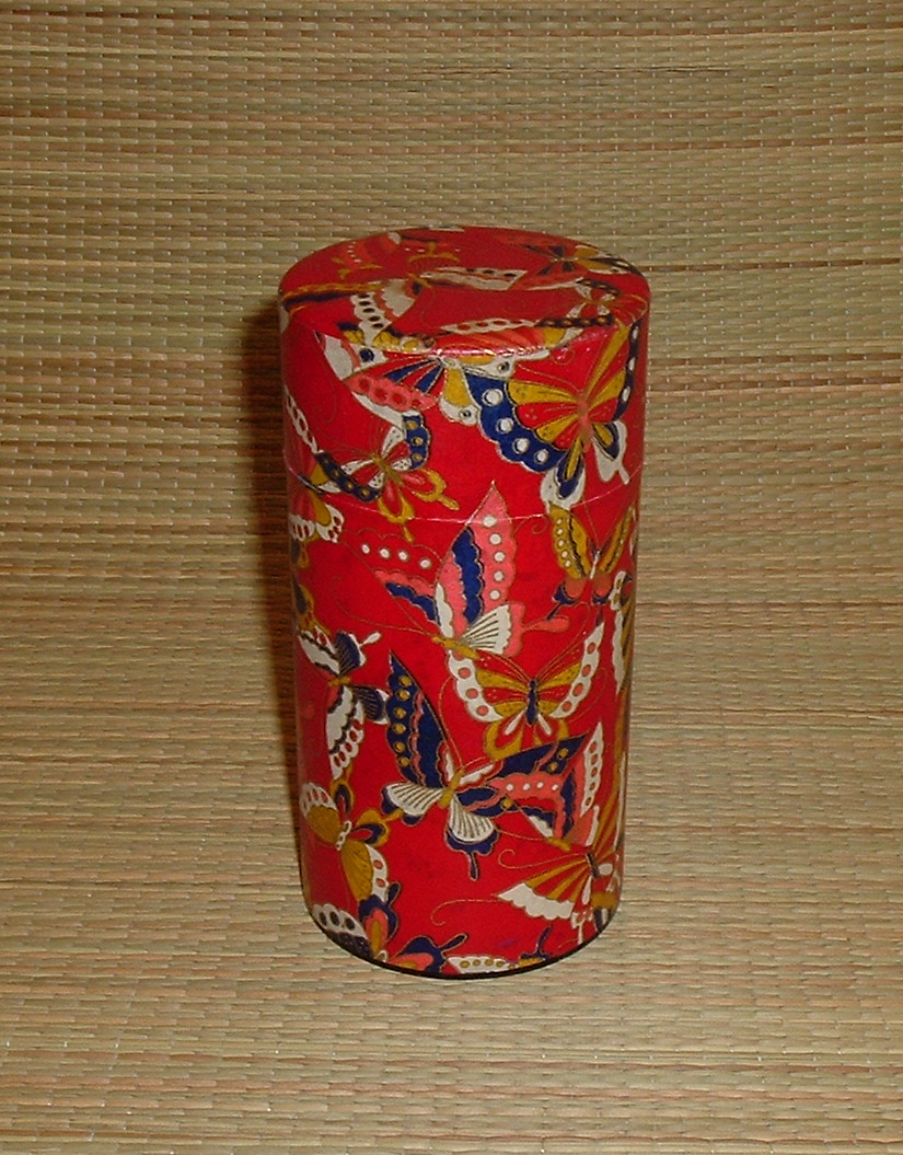 003 Tea canister - butterflies on red.jpg