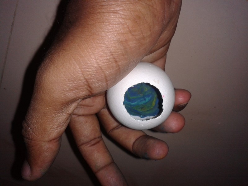 006-Press the clay in side the egg.jpg