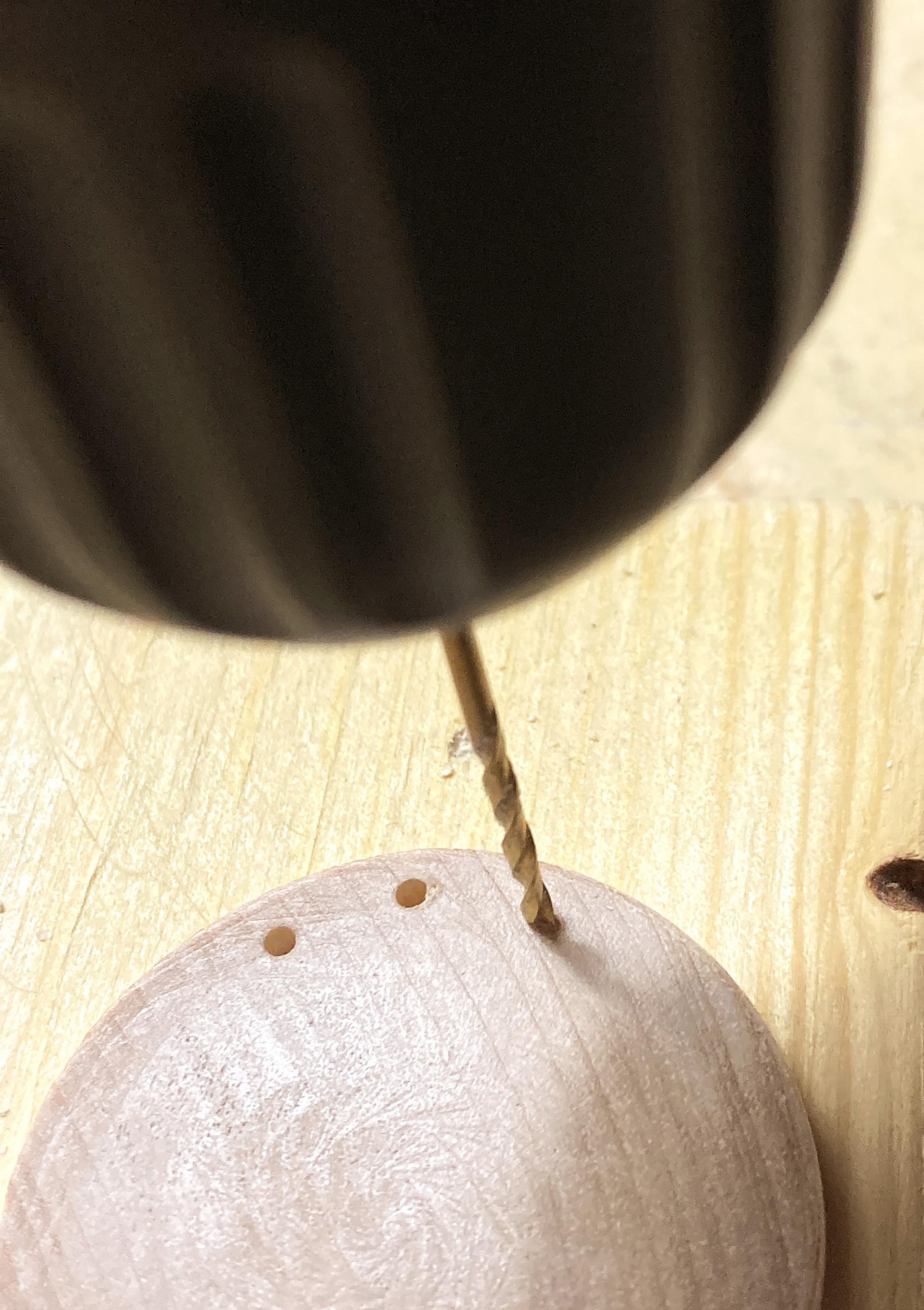 01 Mixed media earrings-Drilling into wood disk on top of block.JPG