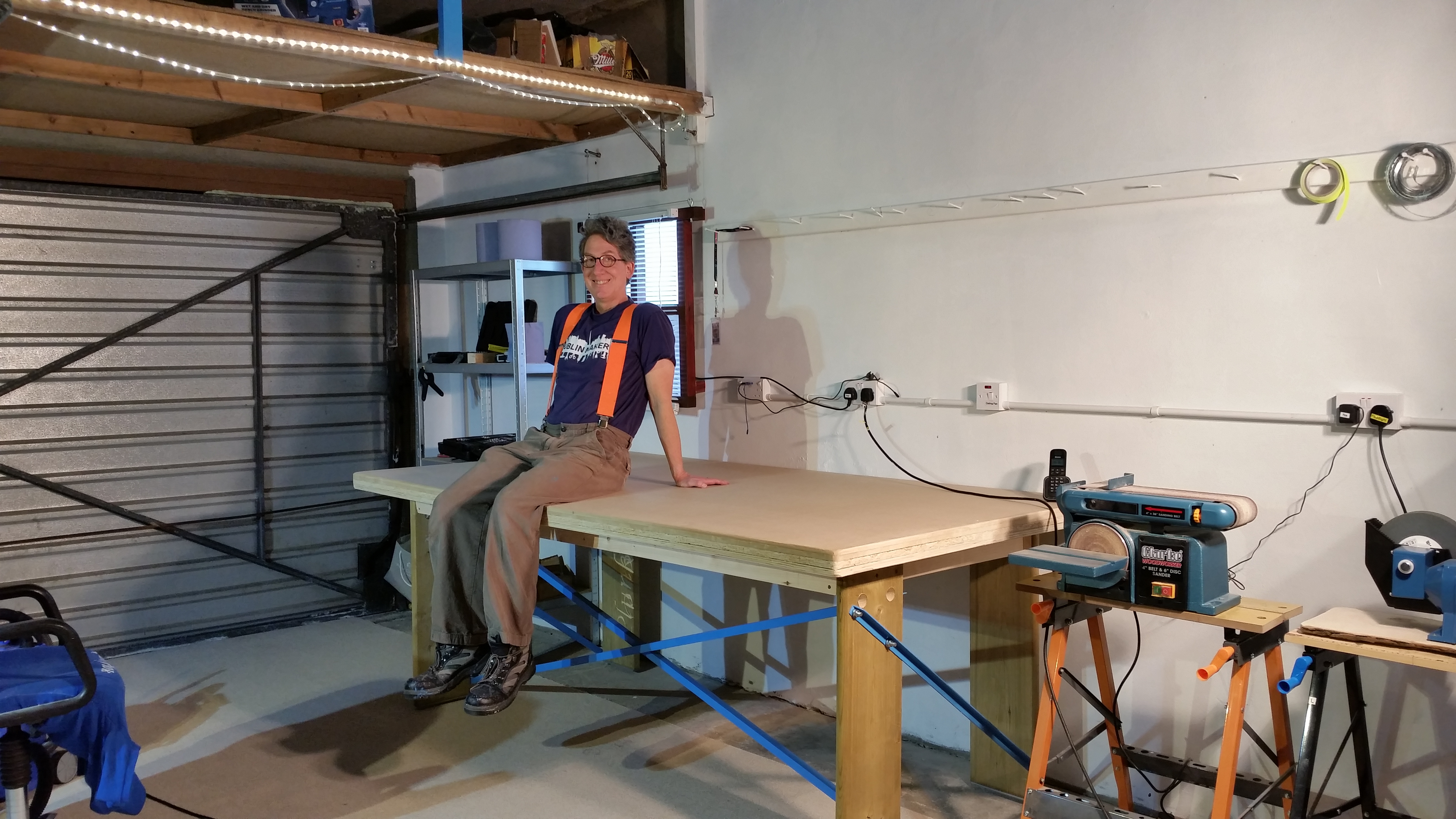 01. Steve on very sturdy new workbench.jpg