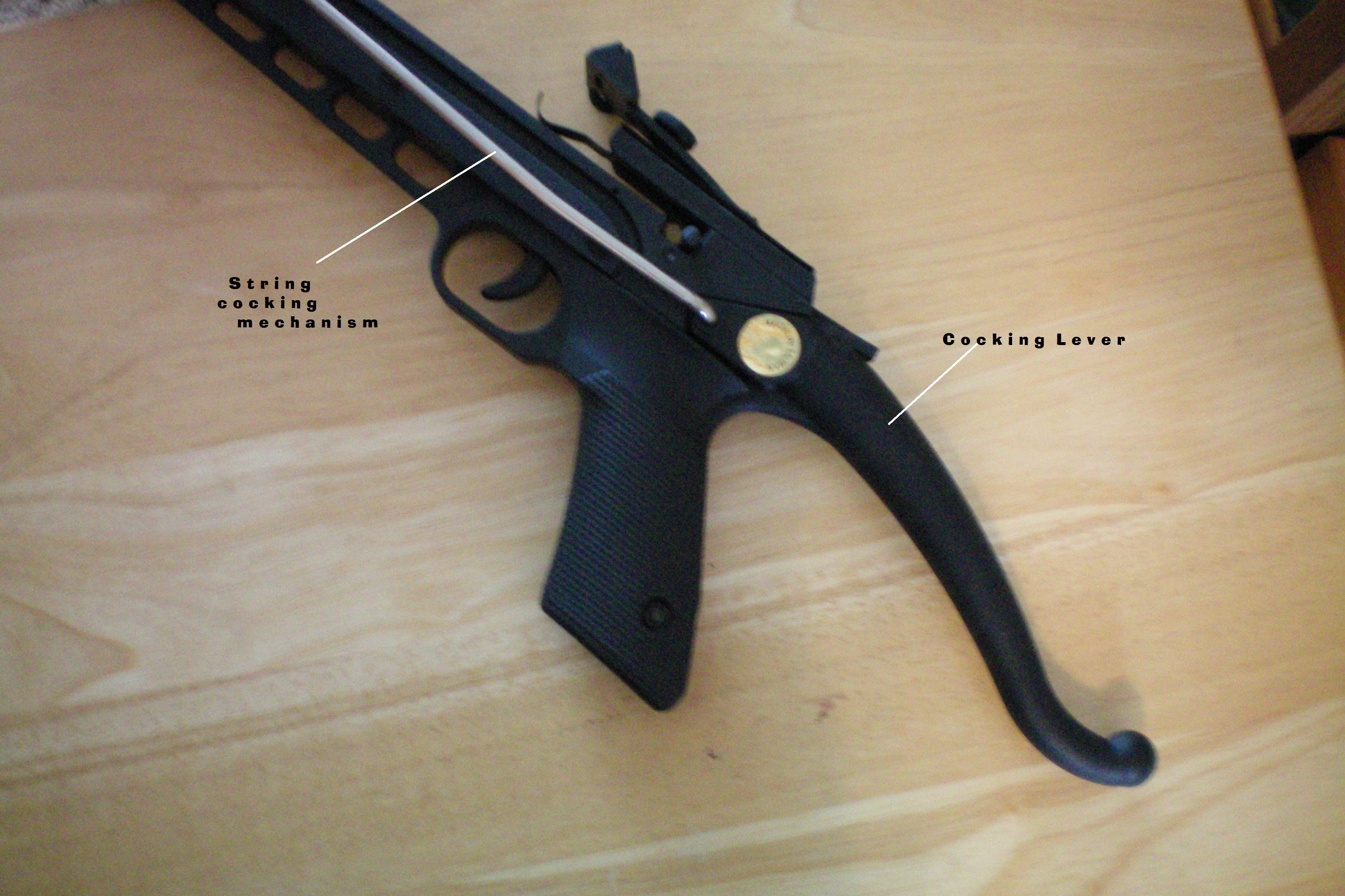 08 labeled Pistol grip showing cocking lever.JPG