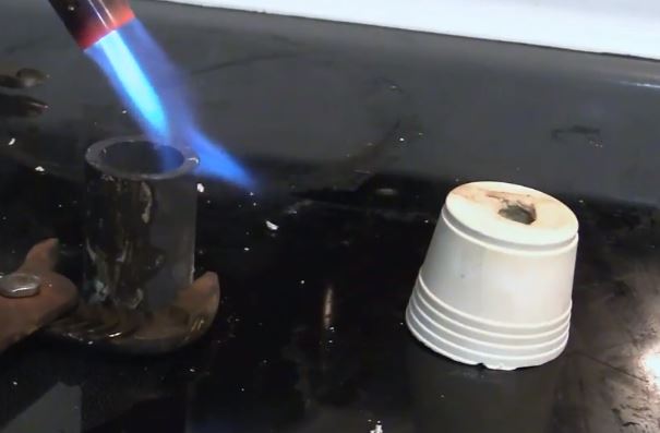 10-melting metal with torch.JPG