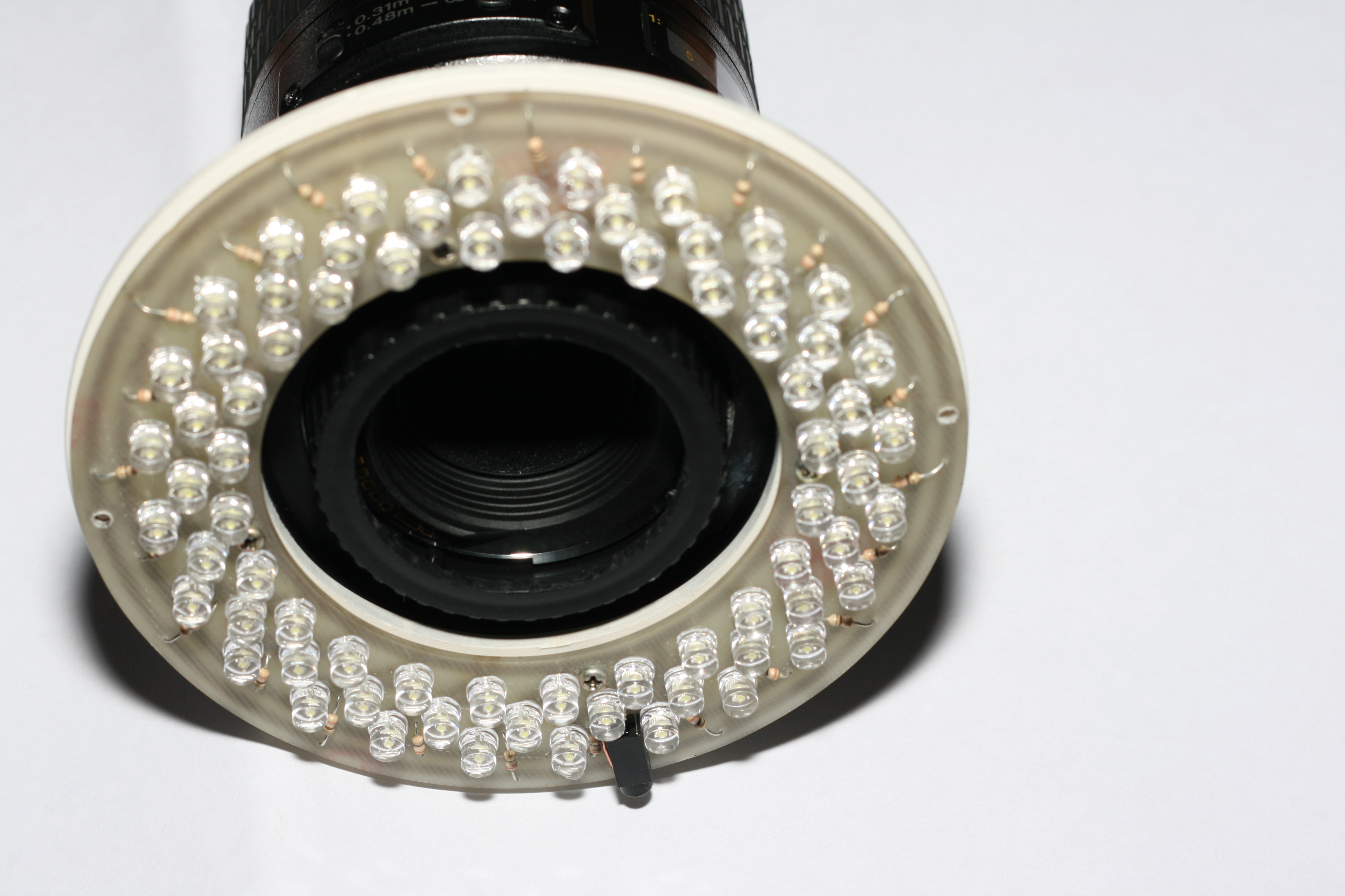 12 reversmounted on canon 100m f2.8 front view.jpg