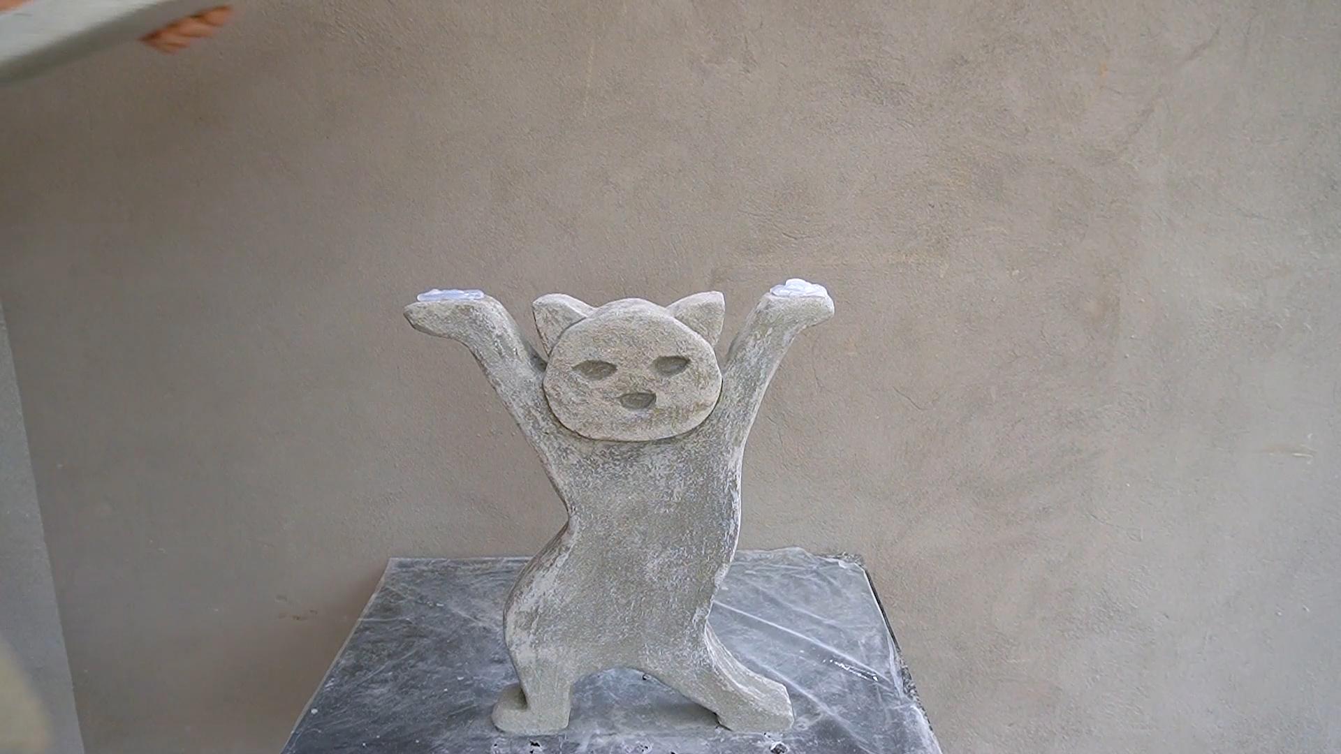 14. Amazing concrete cat shaped coffee table.00_03_39_17.Still021.jpg