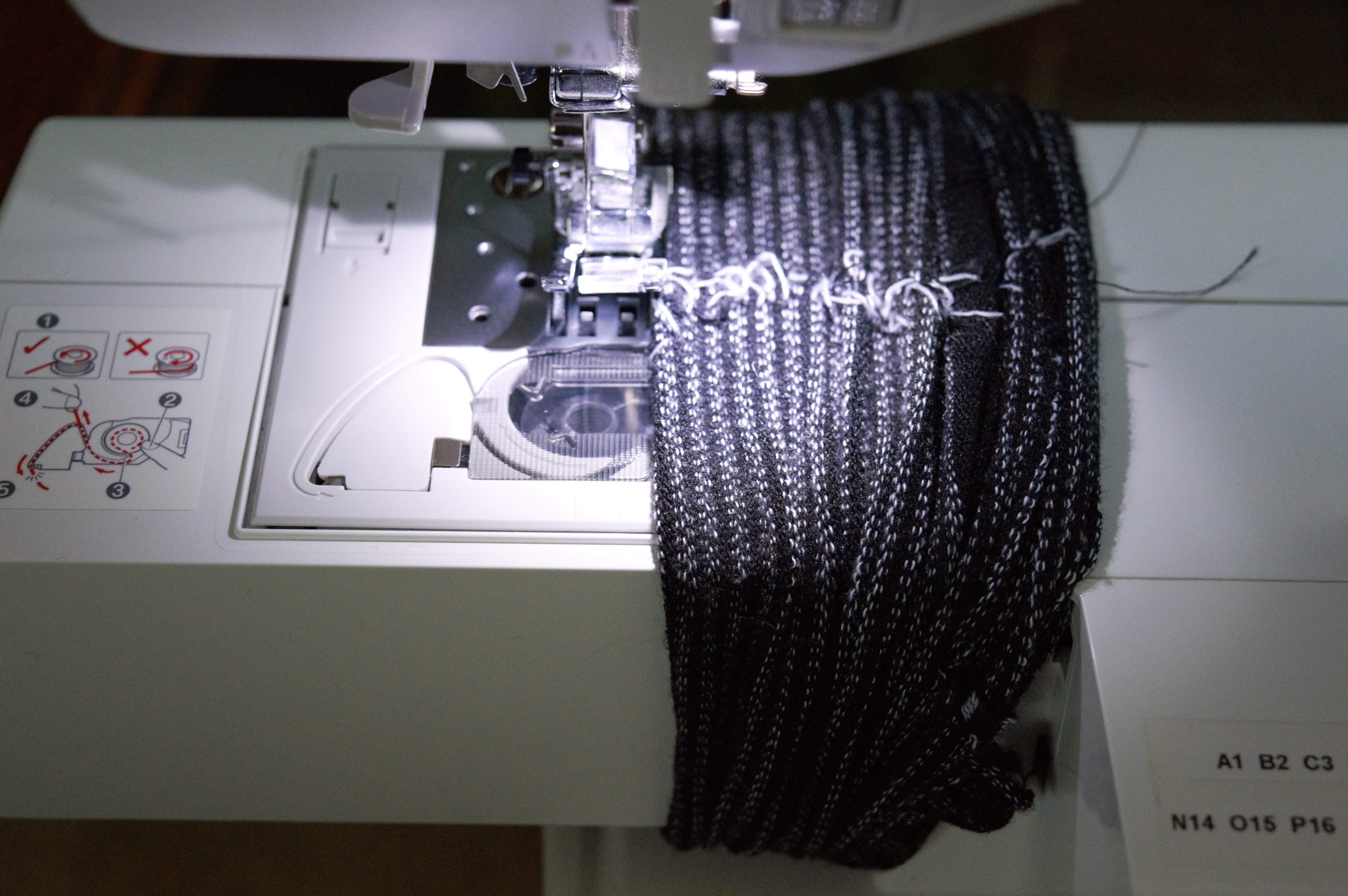 18 slide sock on sewing machine.jpg