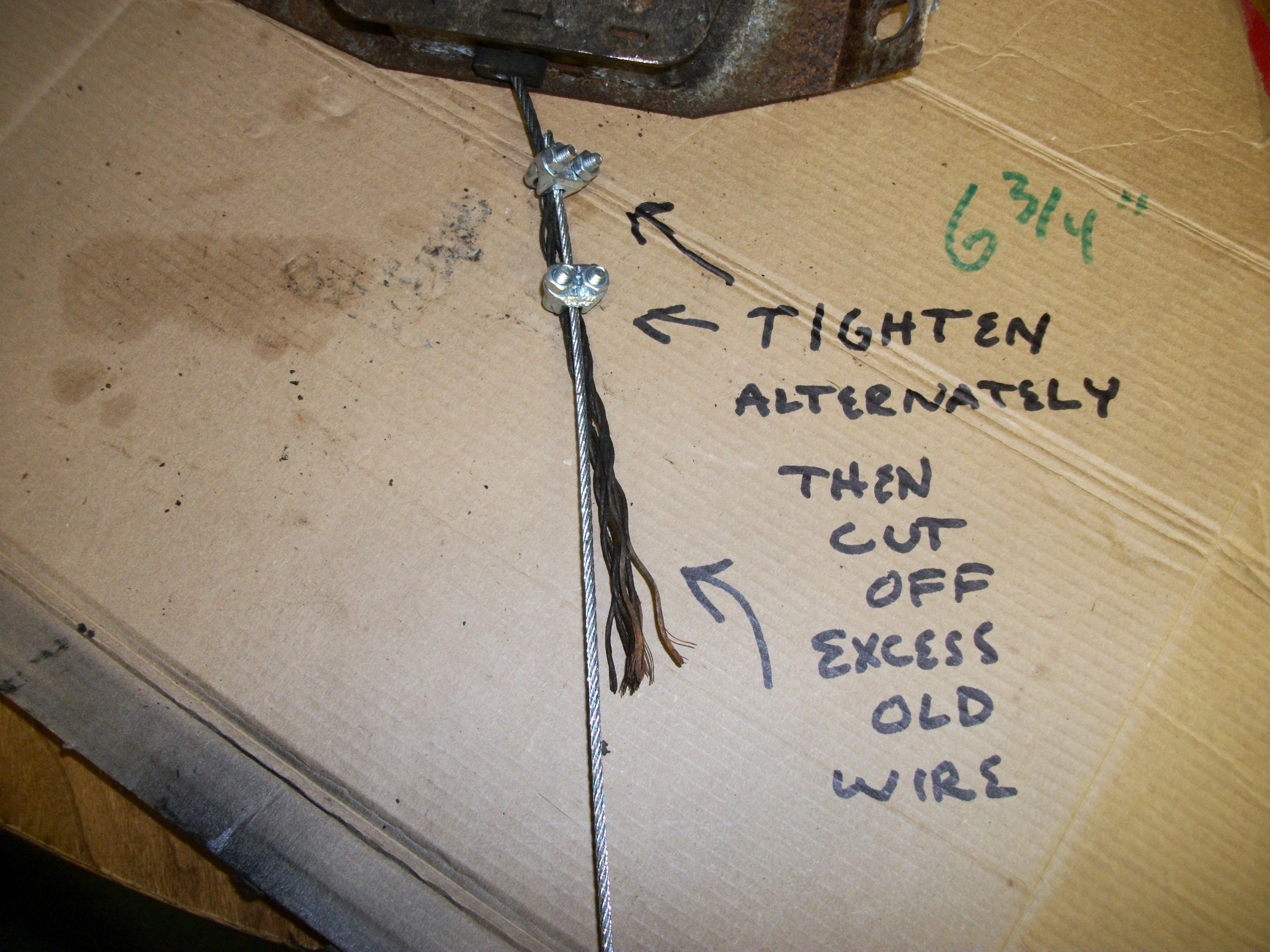 1G tighten clips alternately,then cut off excess frayed wire..JPG