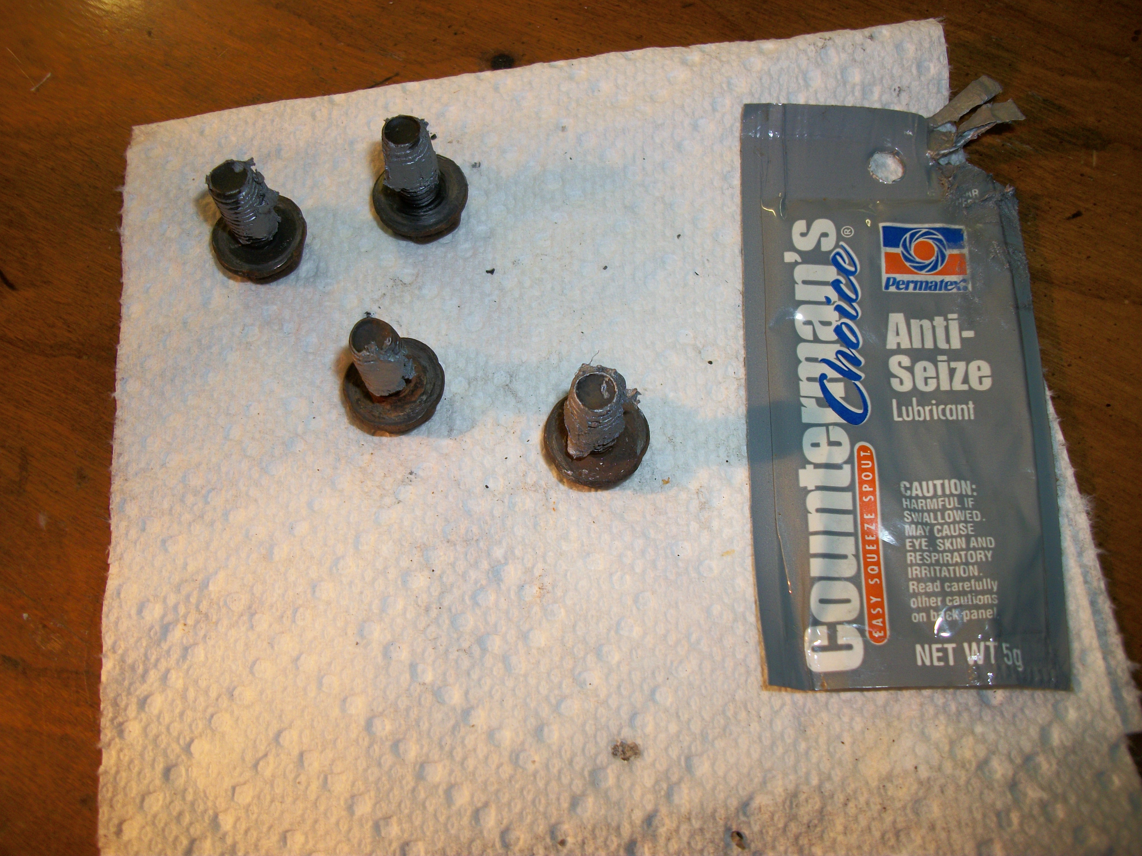 1N put anti seize lube on housing to frame bolts.JPG