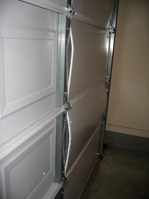 2010 Installation of radiant barrier on garage door007.jpg