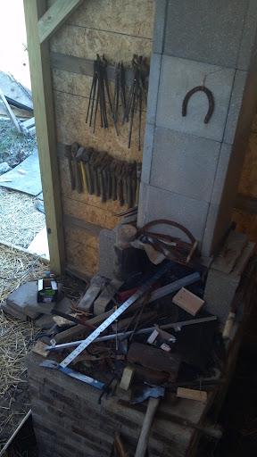 2012-02-26_14-51-13_238 view from the rafters of the forge um tool pile.jpg