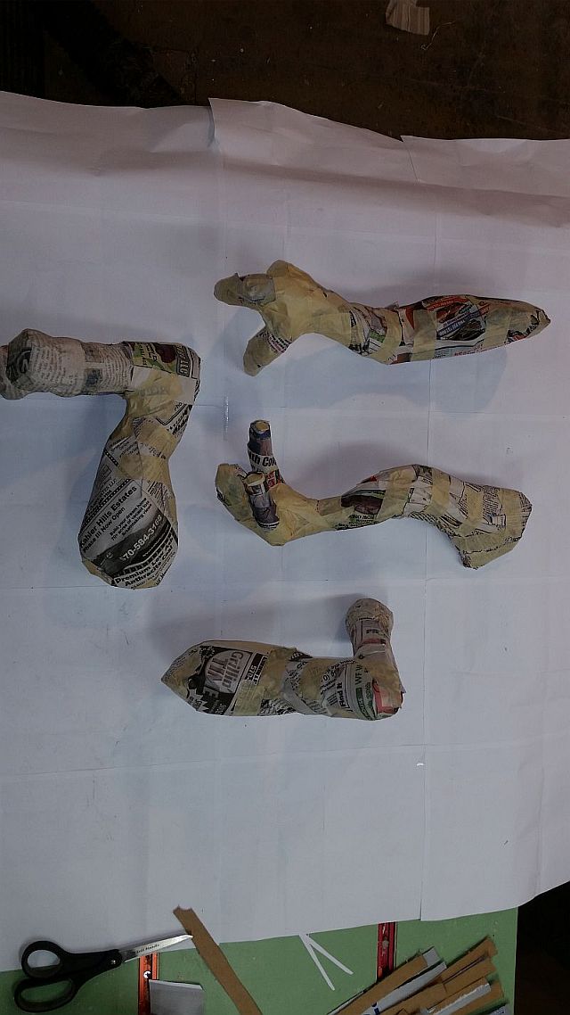 25 Arms &amp; Legs wrapped with newspaper.jpg