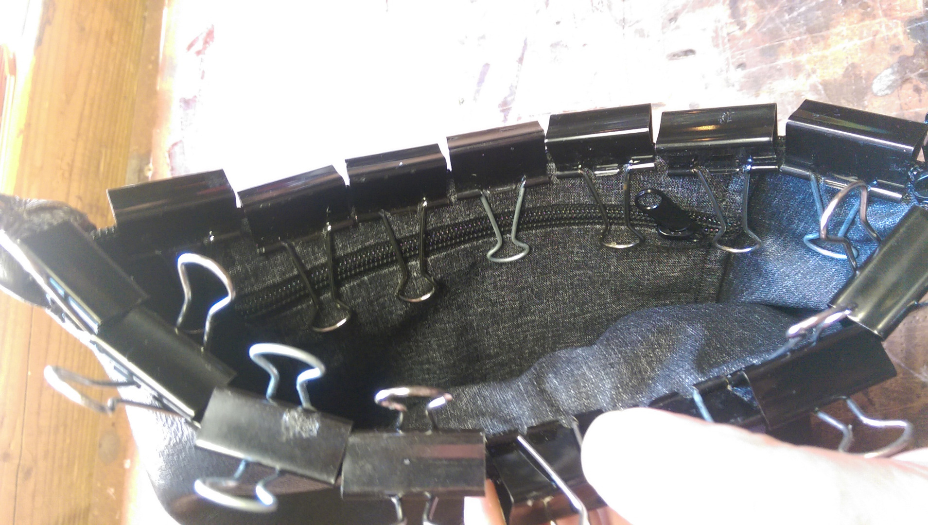 25 gluing the liner under the zipper.jpg