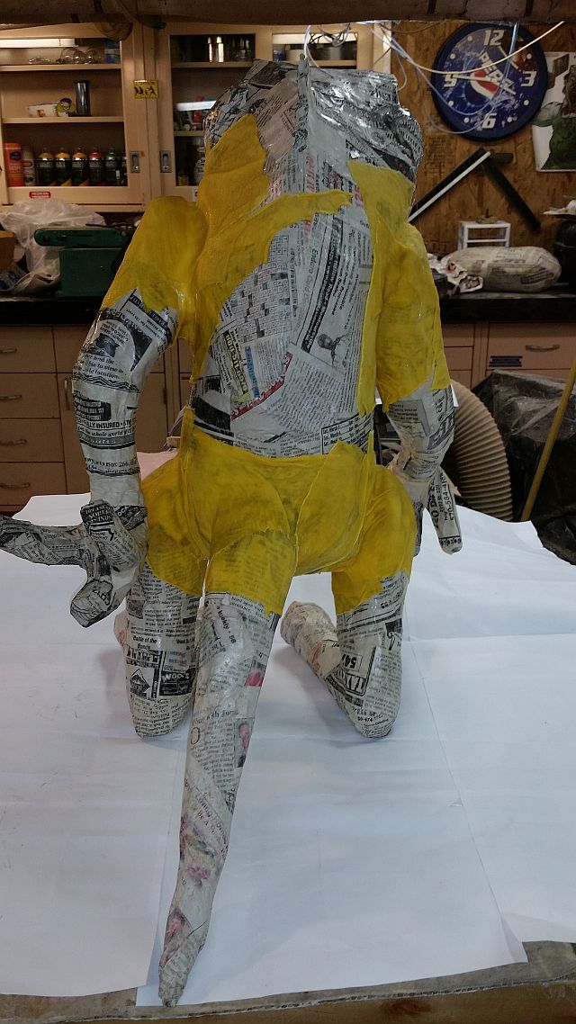 29 Reinforcing arms and legs with cloth mache.jpg