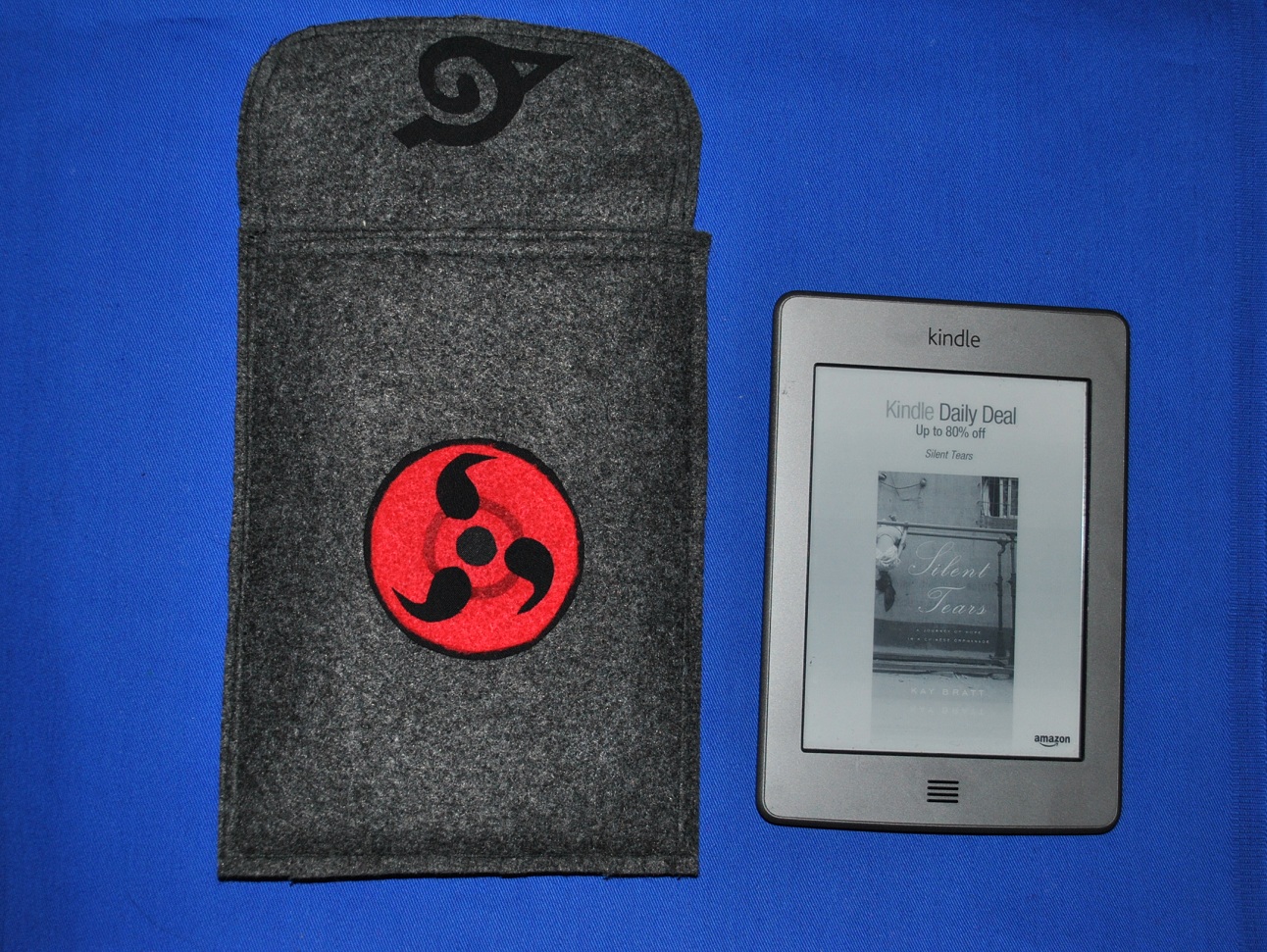 2_naruto_sasuke_sharingan_etui_na_kindla_kindle_case_moje_potwory.jpg