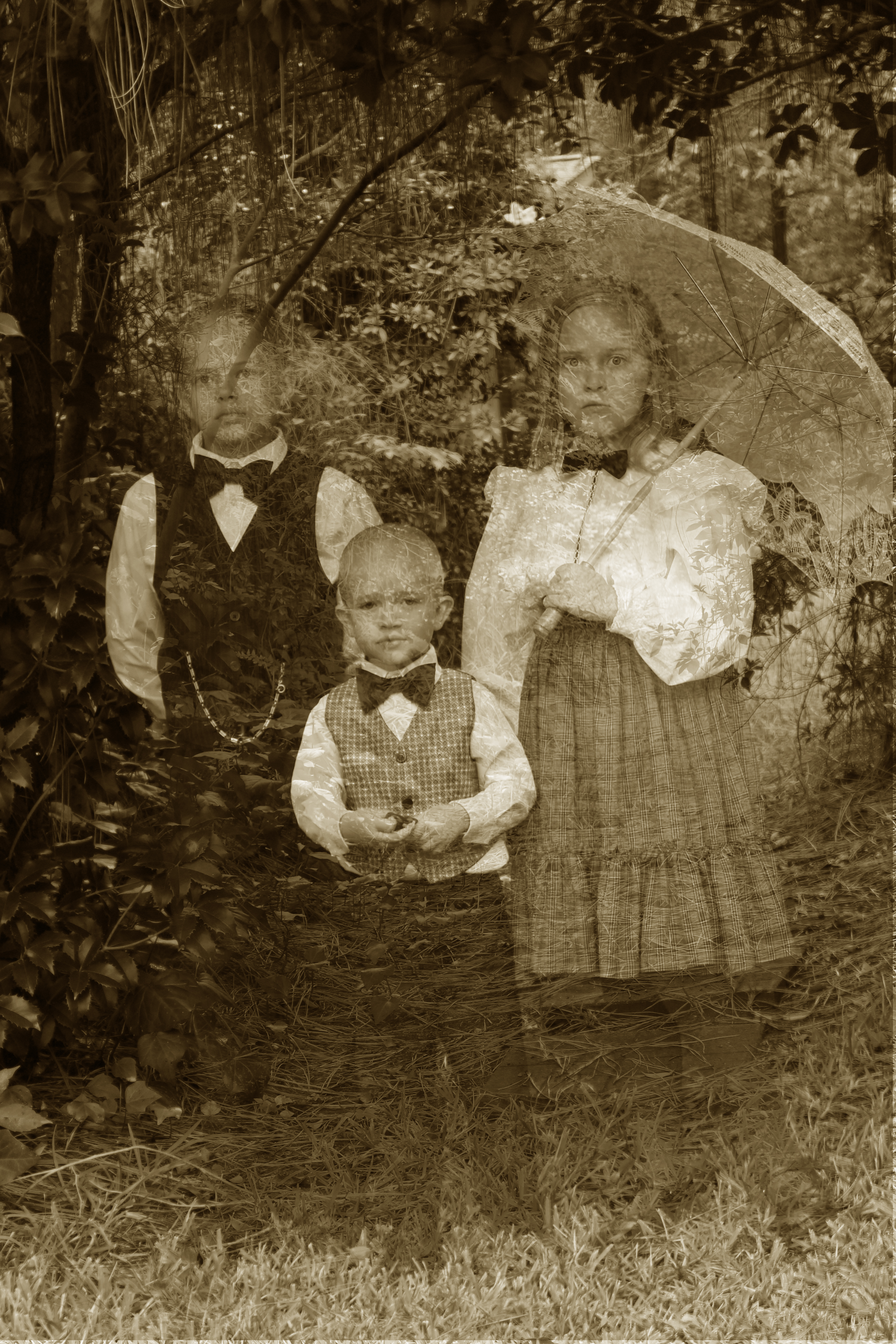 3 kids overhanging sepia jpeg.jpg