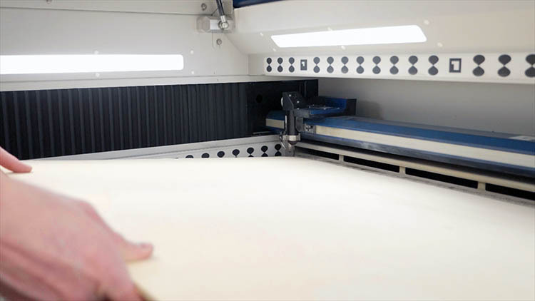 3-loading-plywood-into-laser-machine.jpg