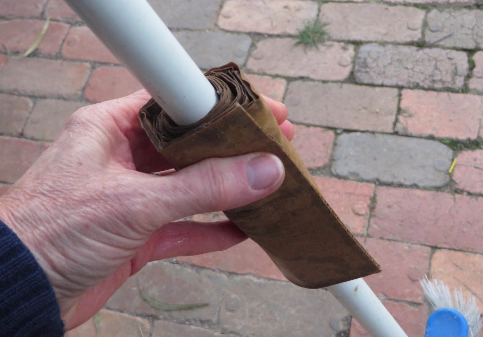 3. wrap around a broom handle.jpg