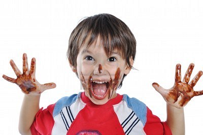 5731002-little-cute-kid-with-chocolate-on-face-and-hands.jpg