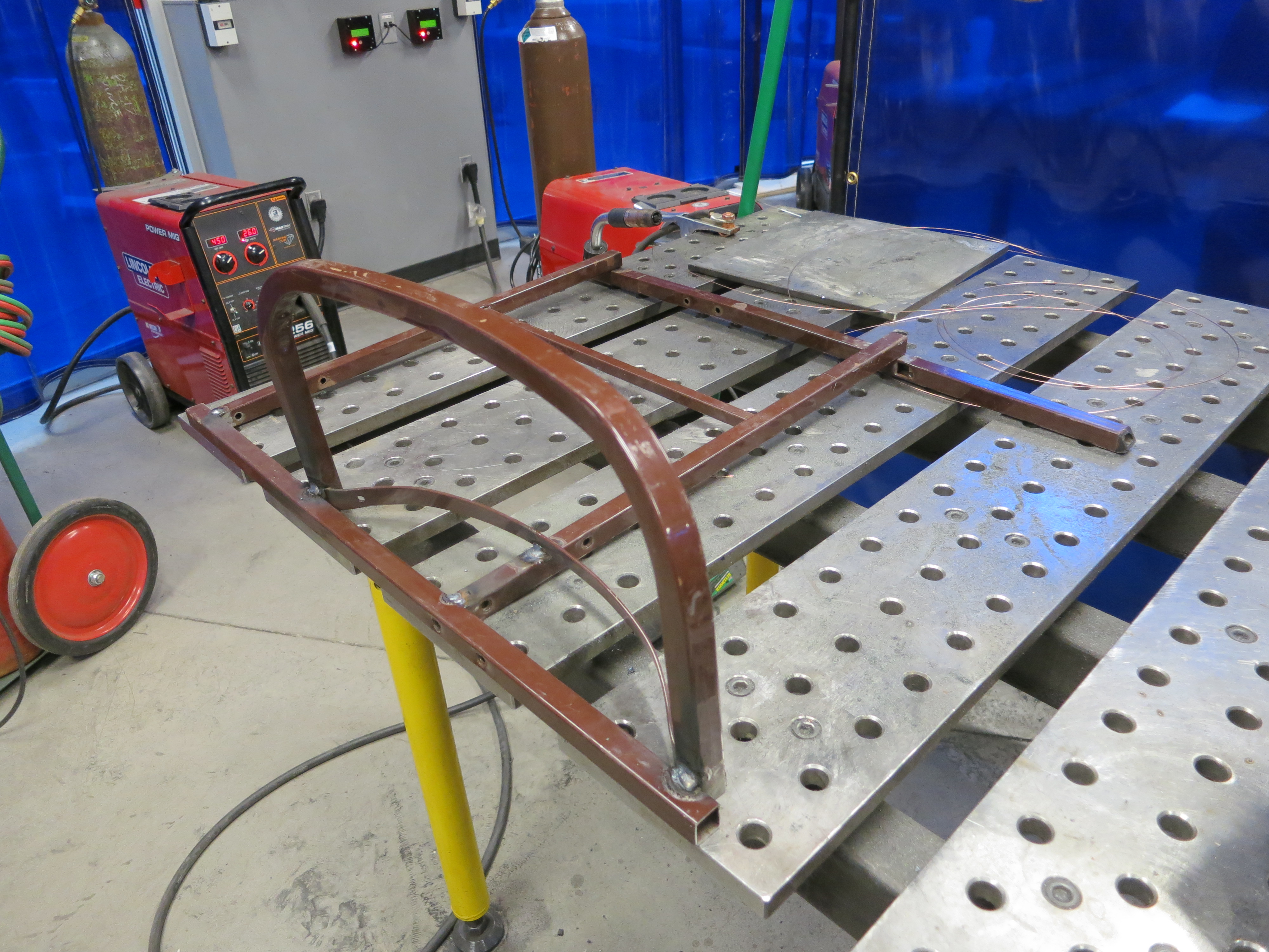 7_ Rack laid out on Welding Table.JPG