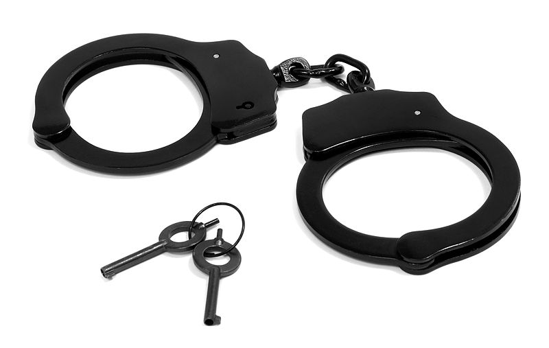 800px-Handcuffs-Black.jpg