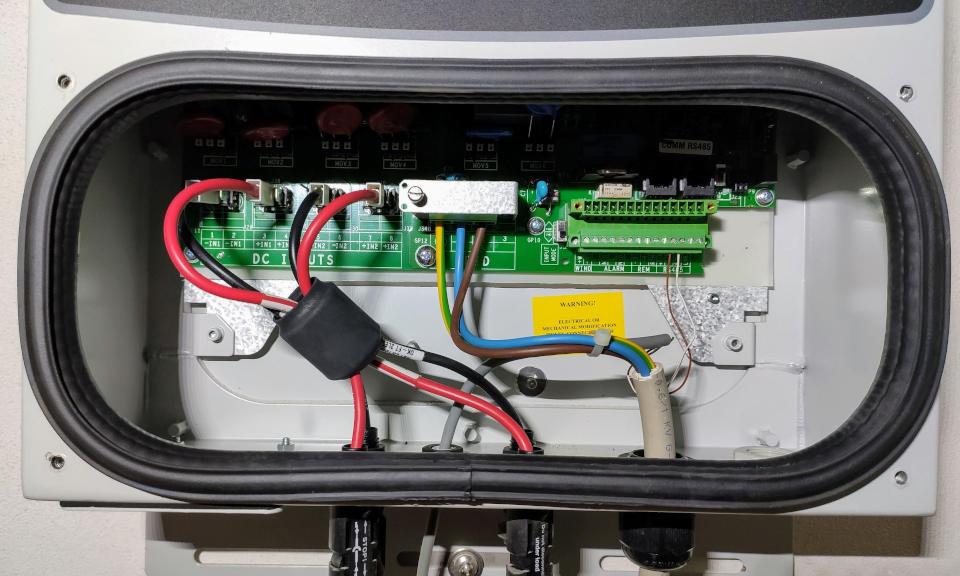 ABB PowerOne Aurora inverter remove panel and detach cable.jpg