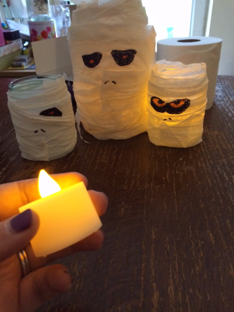 Add LED tealights to the jars.JPG