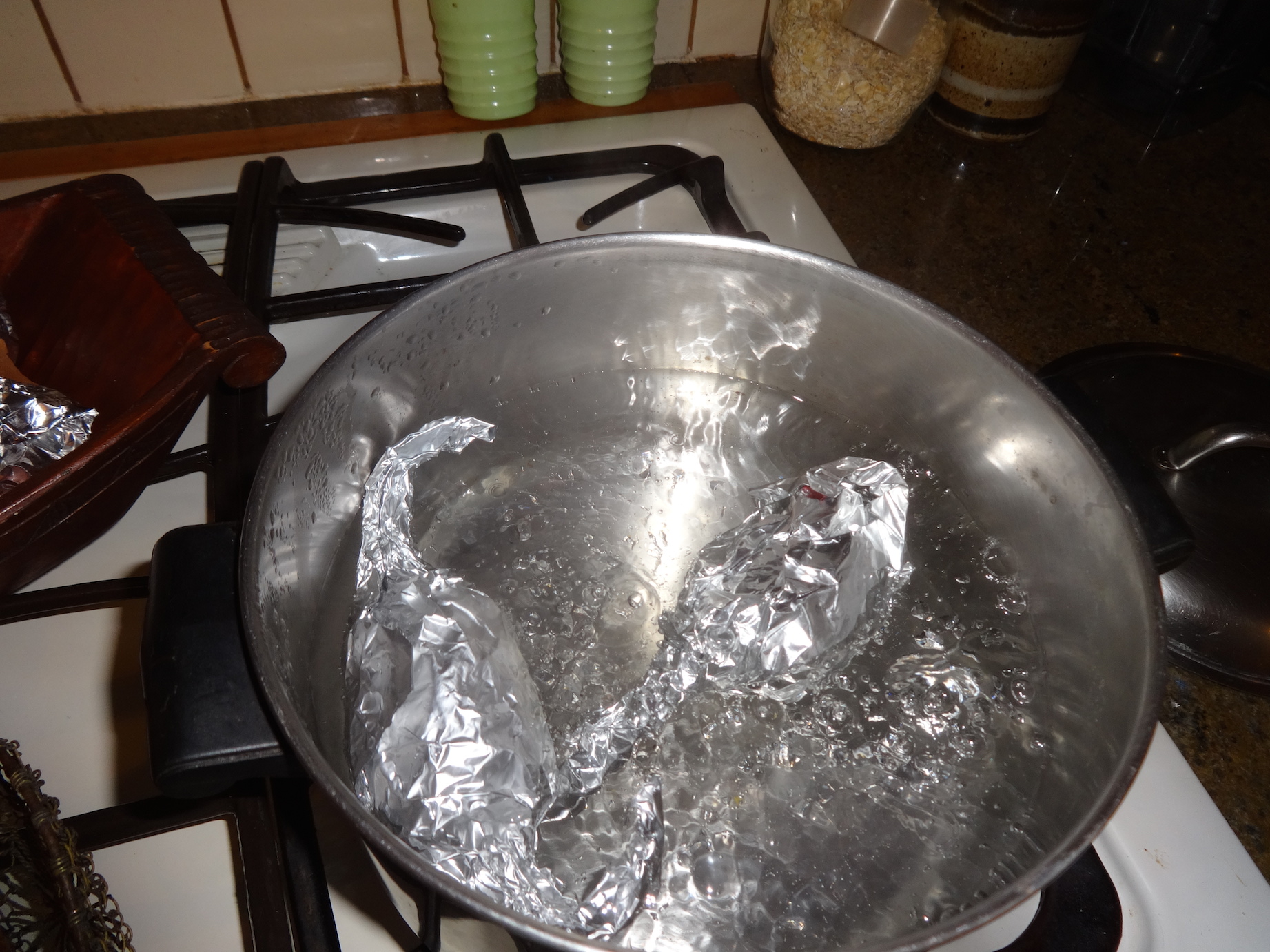 Adding Eggs to Boiling Water-Dutch Dying Eggs 4-15-14.JPG