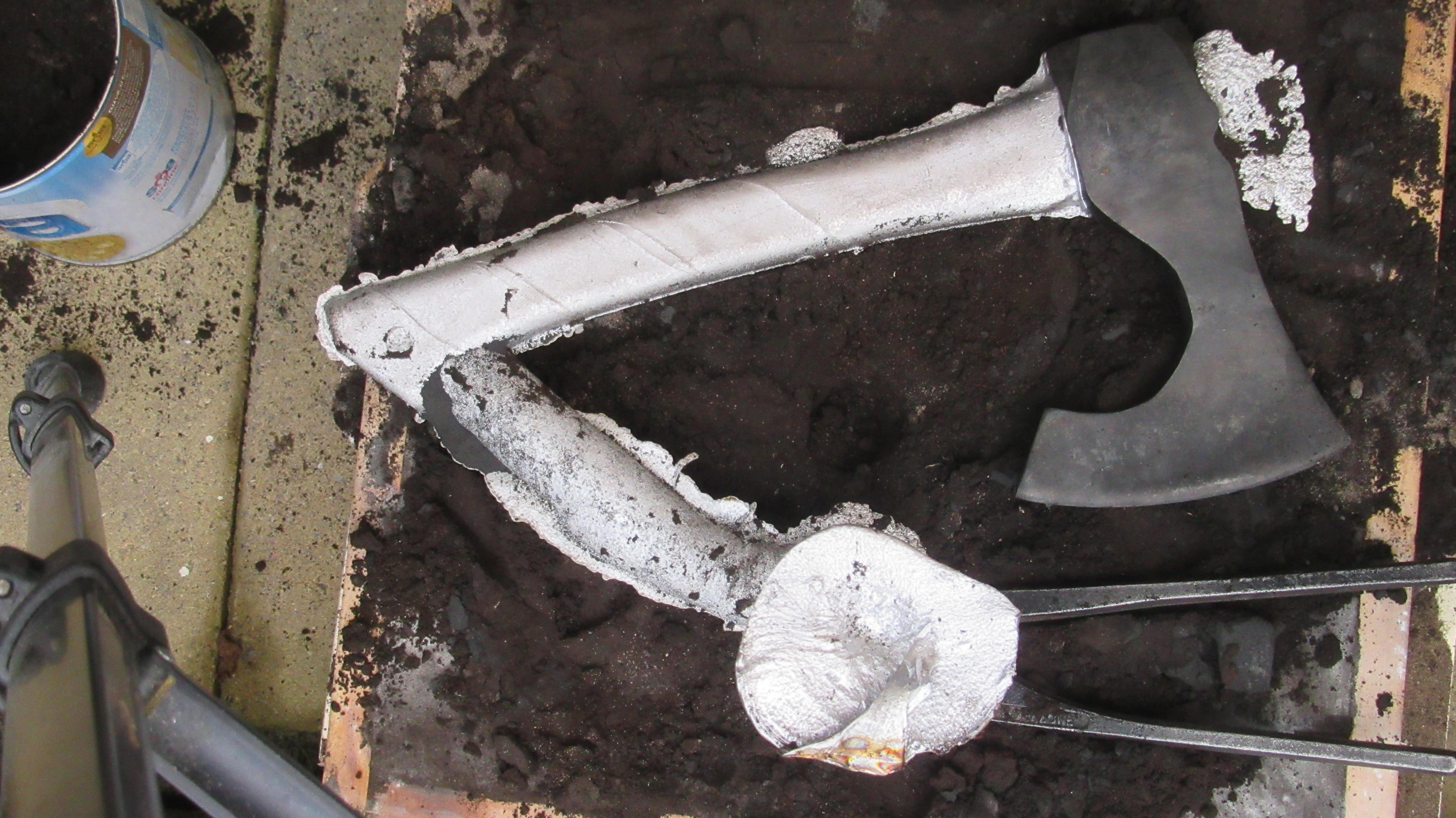 Aluminum axe after molten aluminum pour.JPG