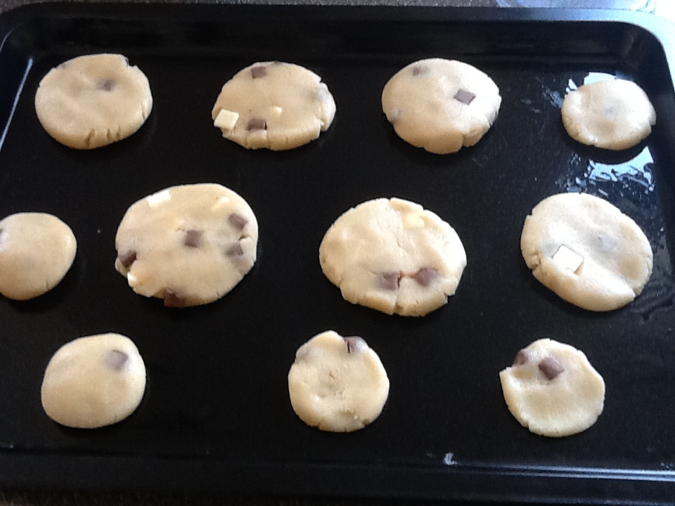 Baking tray with cookie dough on.JPG