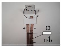 Battery inside holder with LED attached.JPG