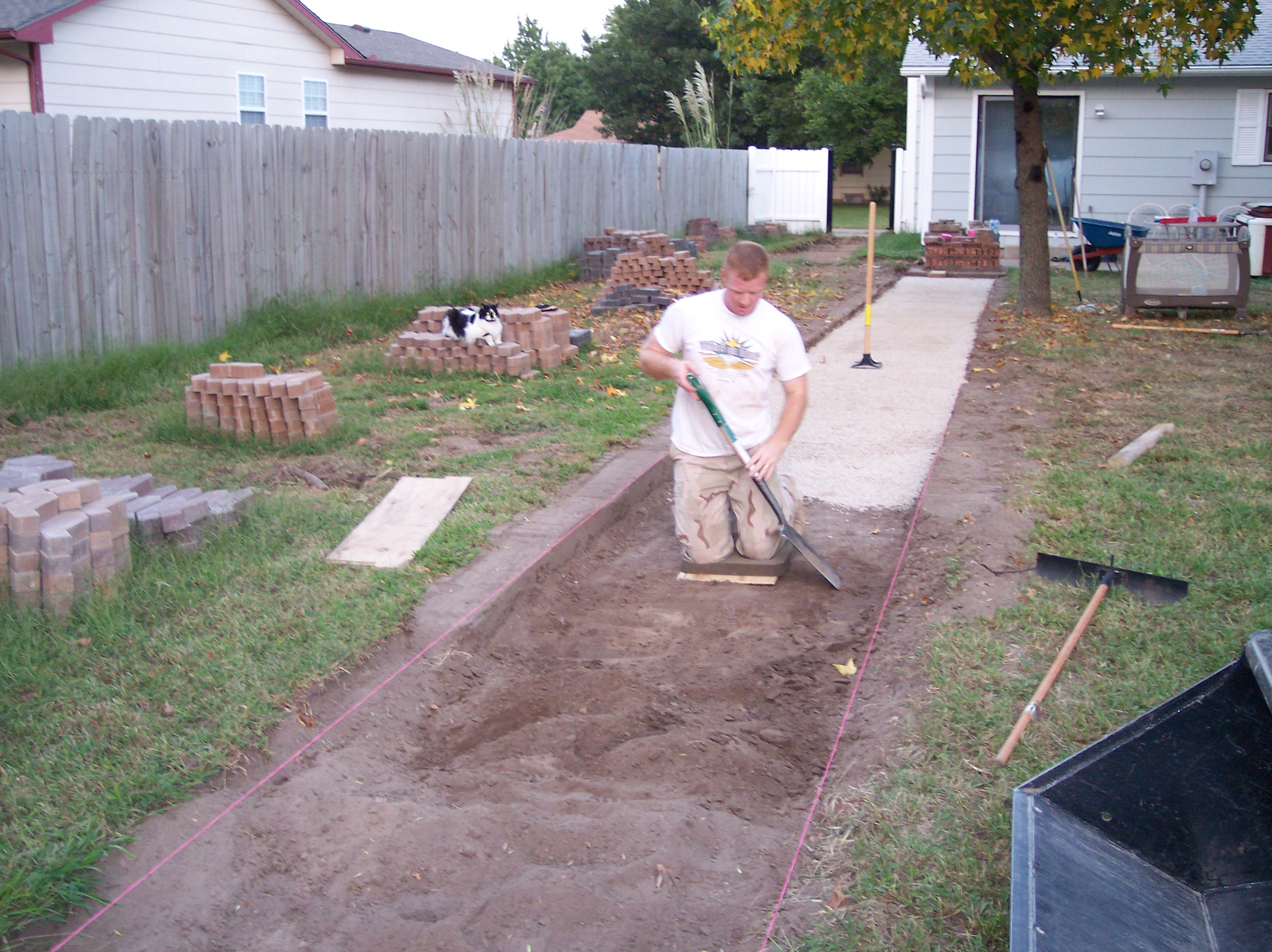 Brian moving dirt September 1, 2008.JPG