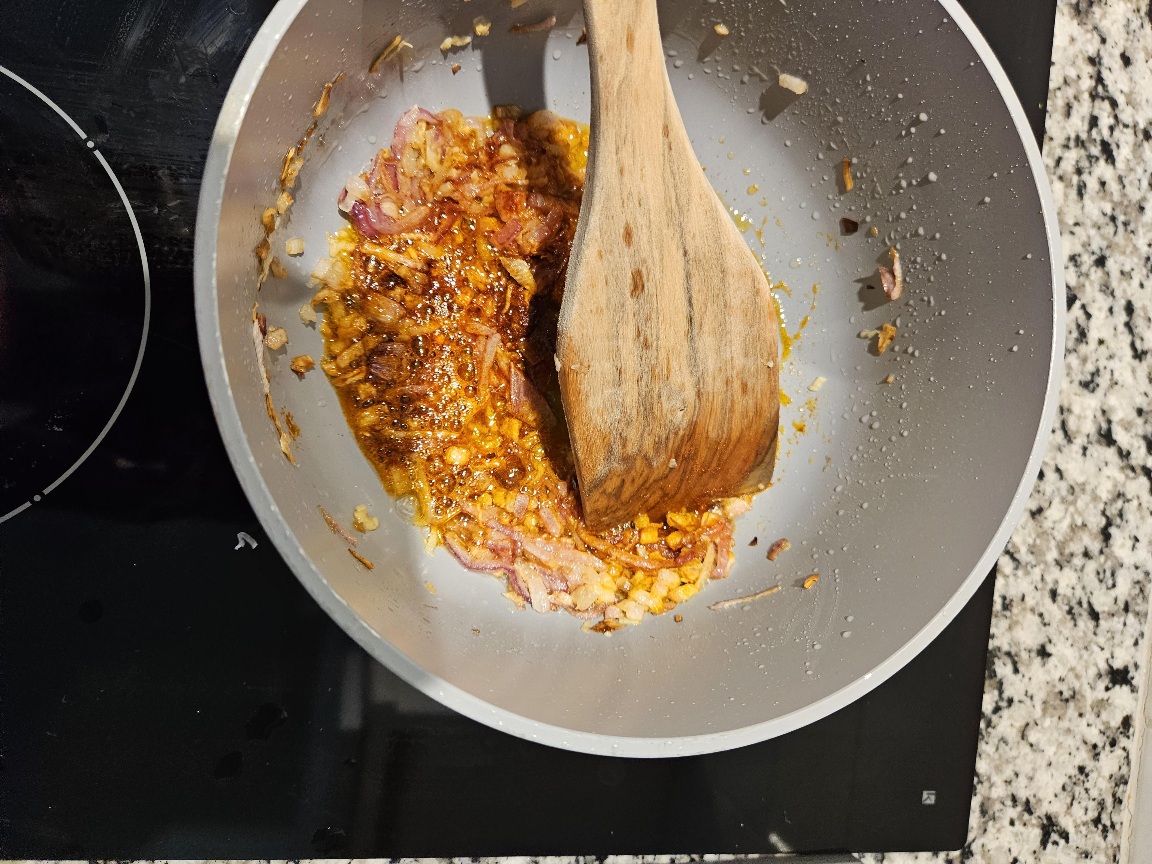 Browned red onions and garlic fried together.jpg