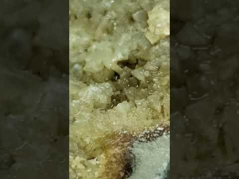 Bubbles caused by drops of vinegar on Calcite