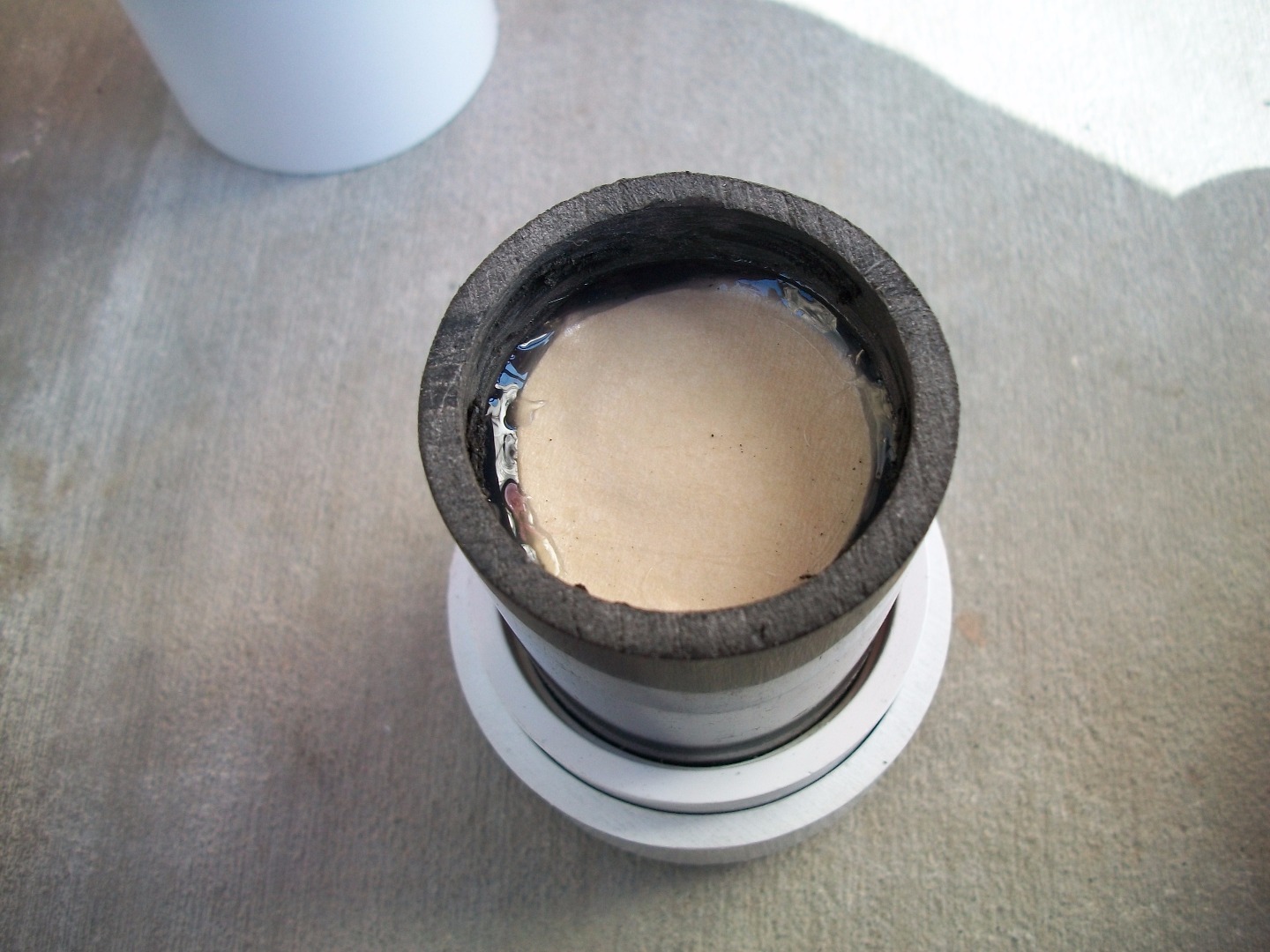 Cardboard roll with tape and hot glue.JPG