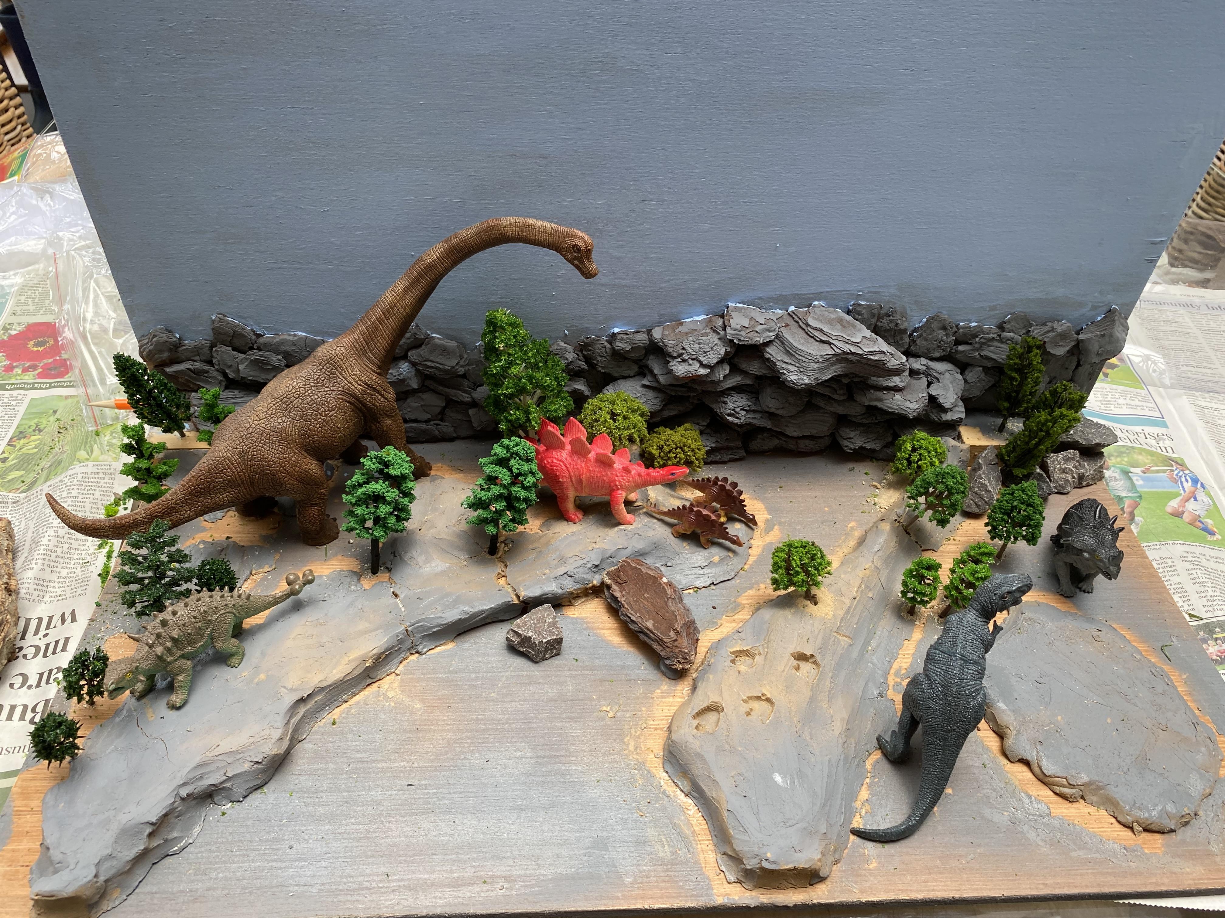 Clay with trees and dinos.jpg