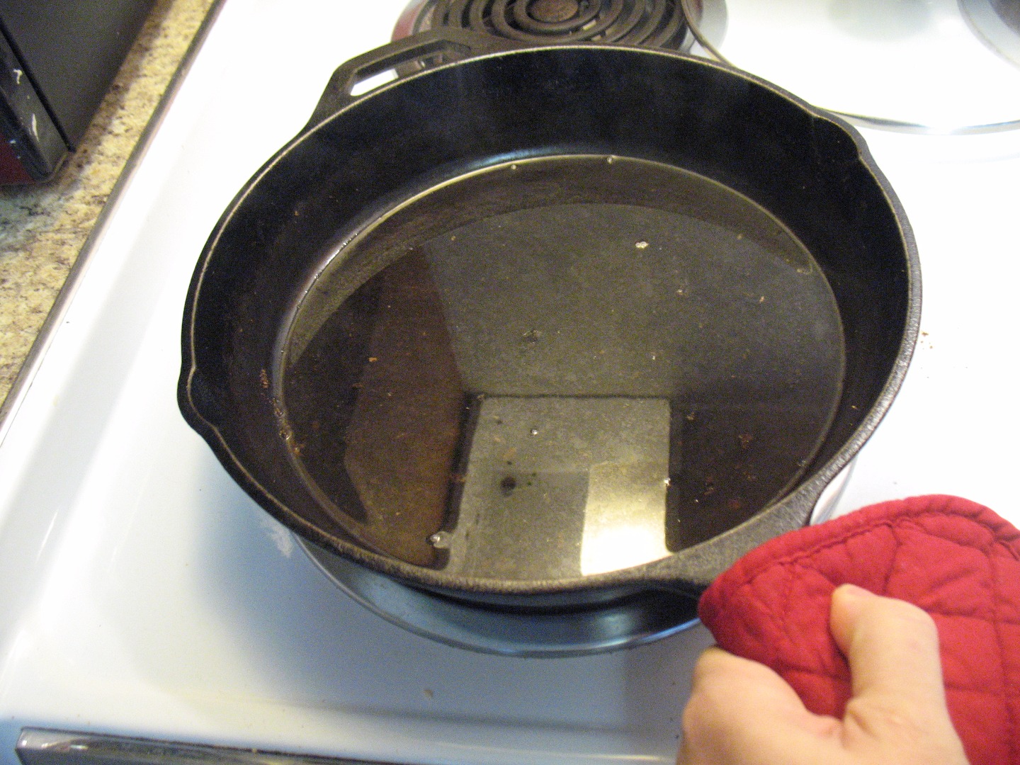 Cleaning a hot skillet 1.JPG