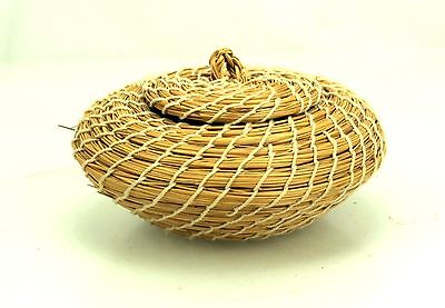 Coiled-Pine-Needle-5-Round-Flattened-Basket-with.jpg