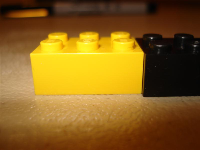 Comparing construction bricks - Lego Closeup.JPG