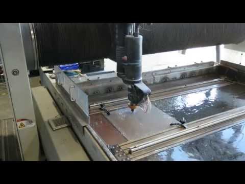 Cutting a stainless steel plate for Pinya 3 with a waterjet