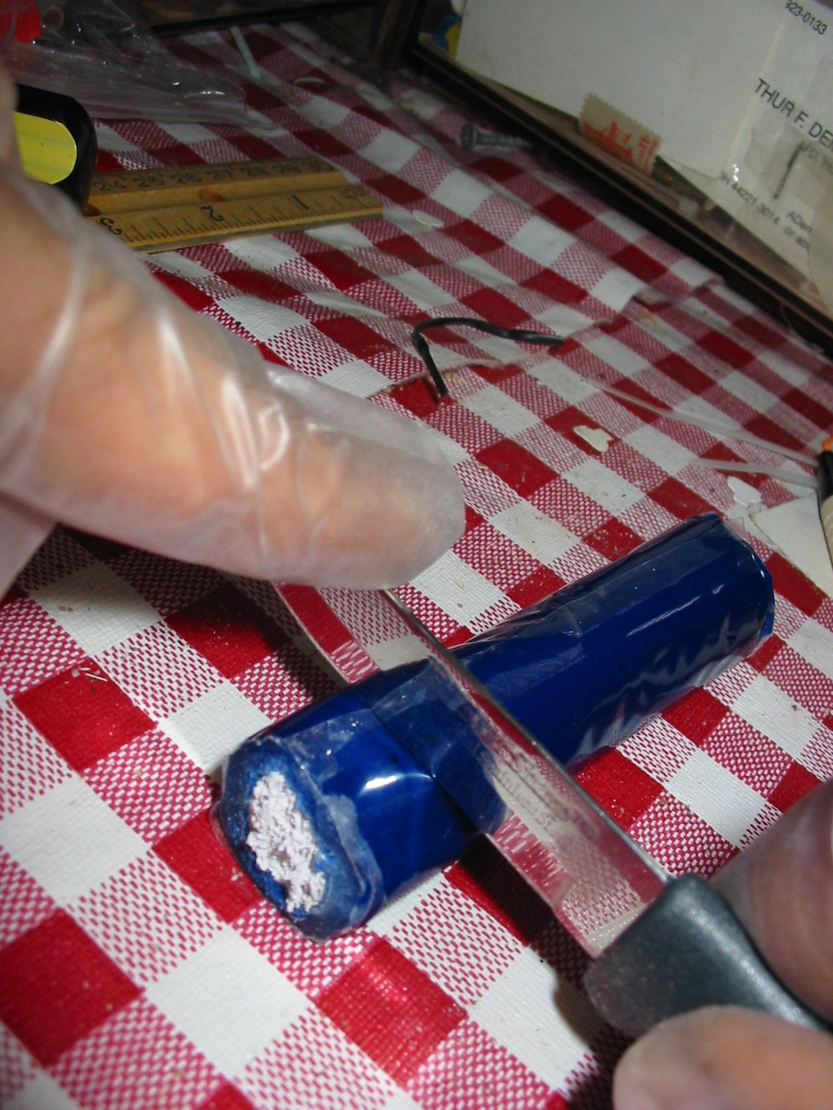 Cutting off portion of epoxy putty.JPG