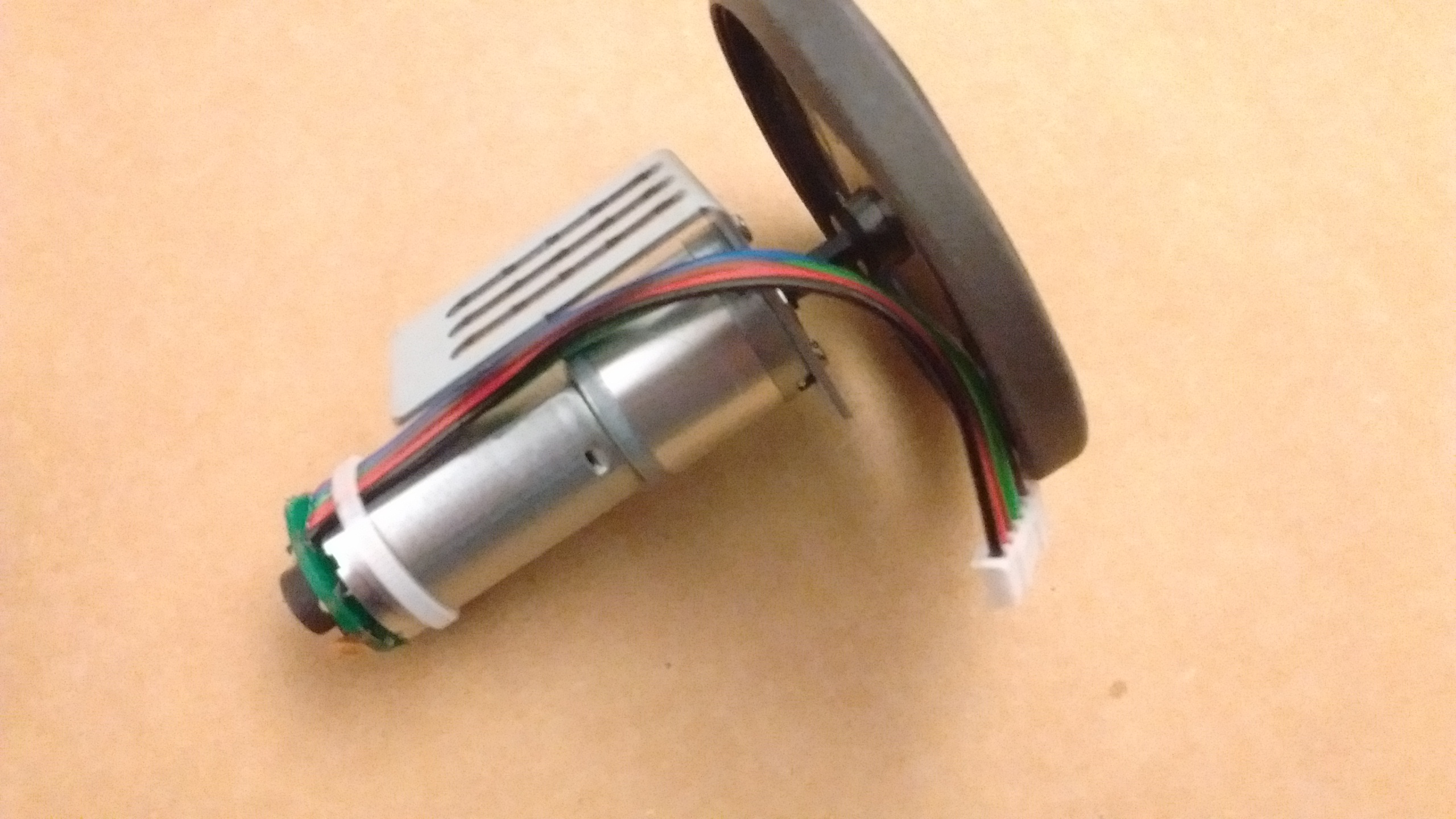 DC motor on the bracket with the wheel.jpg