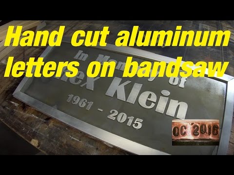 DC. Hand cut aluminum letters name plaque