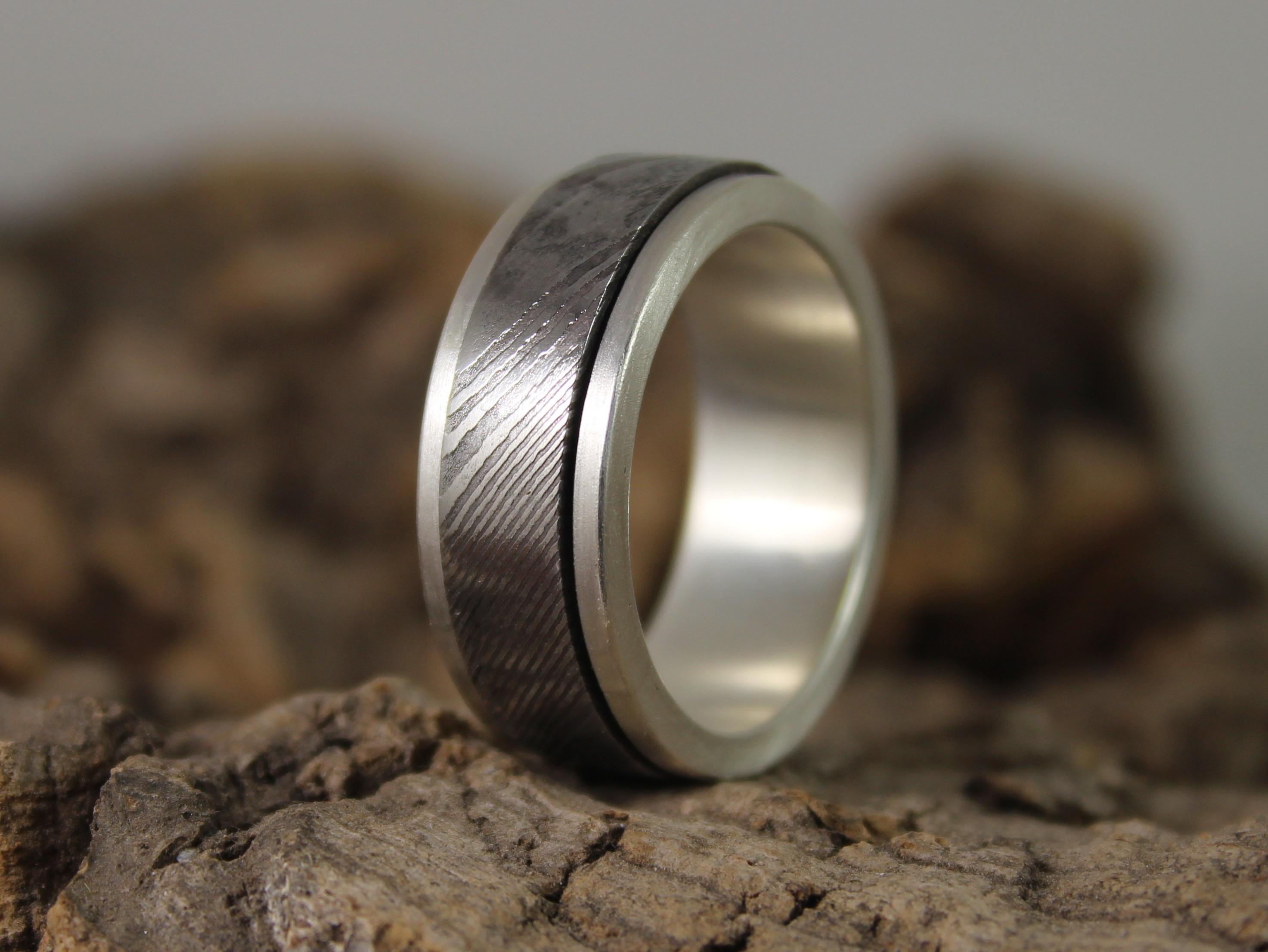 Damascus steel and silver spinner ring 5.JPG