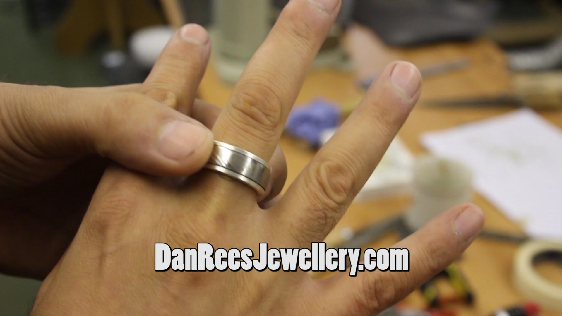 Damascus steel and silver spinner ring 66.jpg