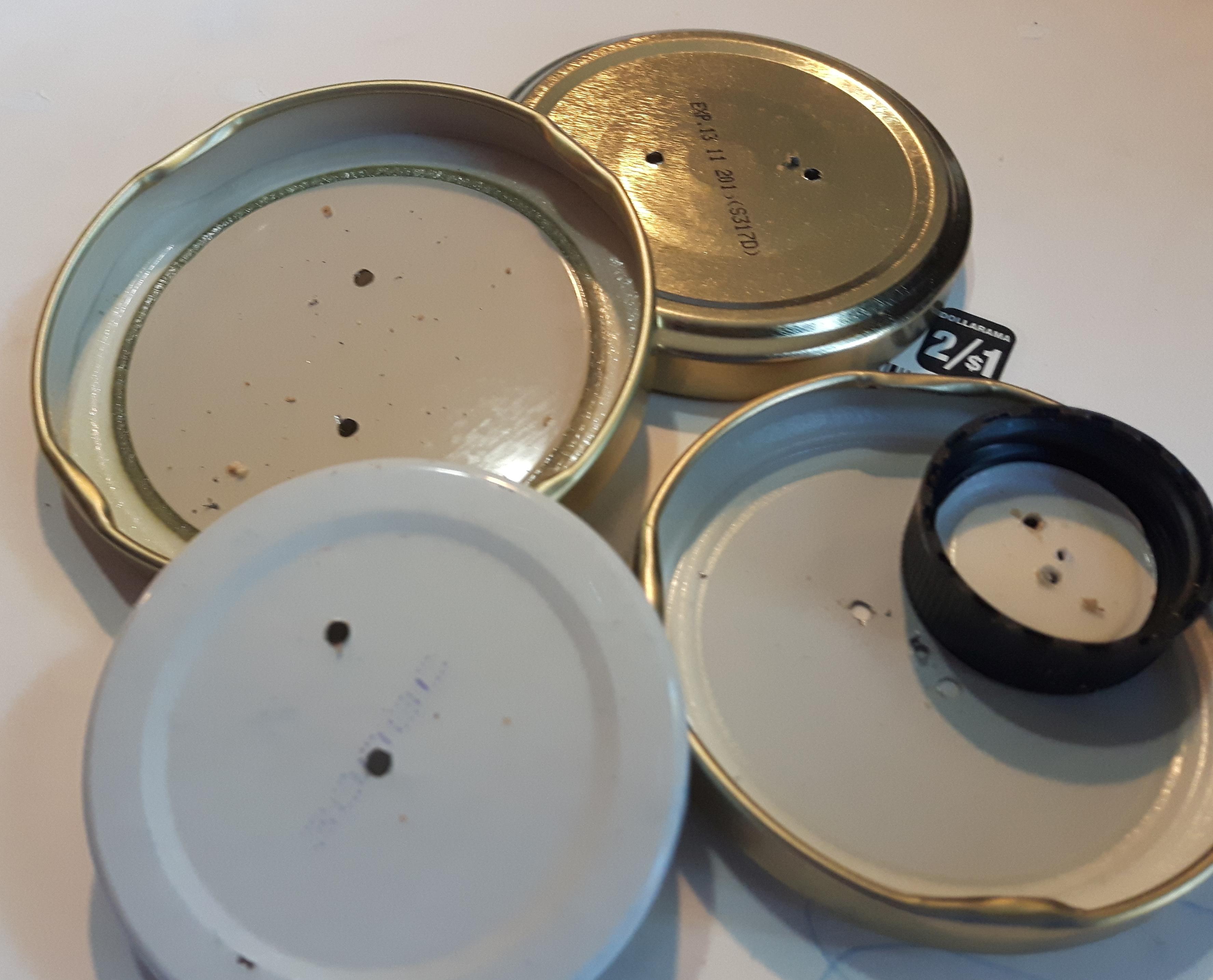 Drilled lids.jpg