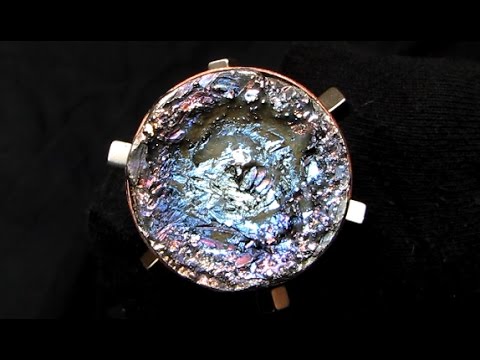 Eye-Catcher Piece with Multiple Spinning Magnets and Bismuth Crystals