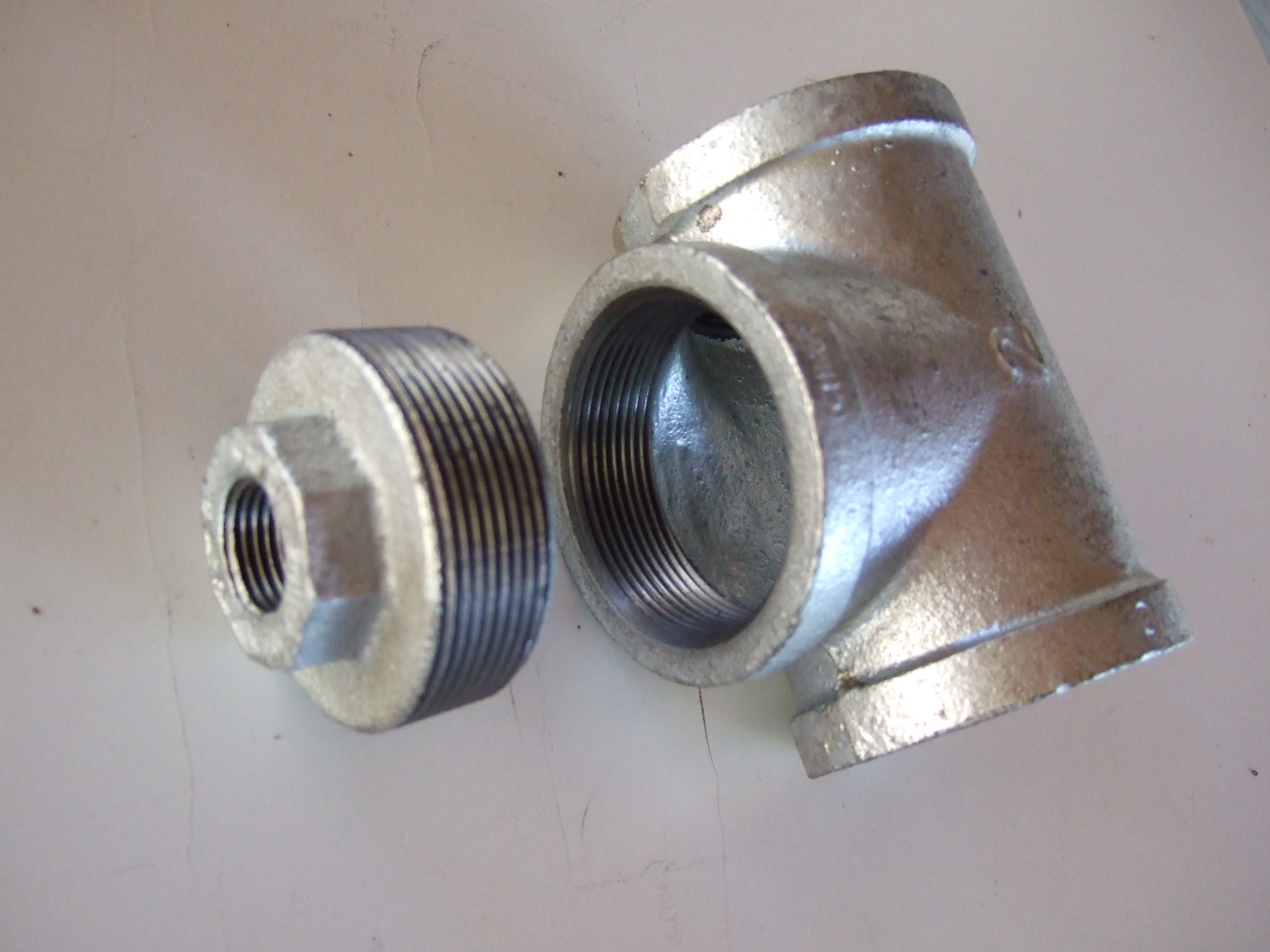 Galv Tee to Hex Bushing.JPG