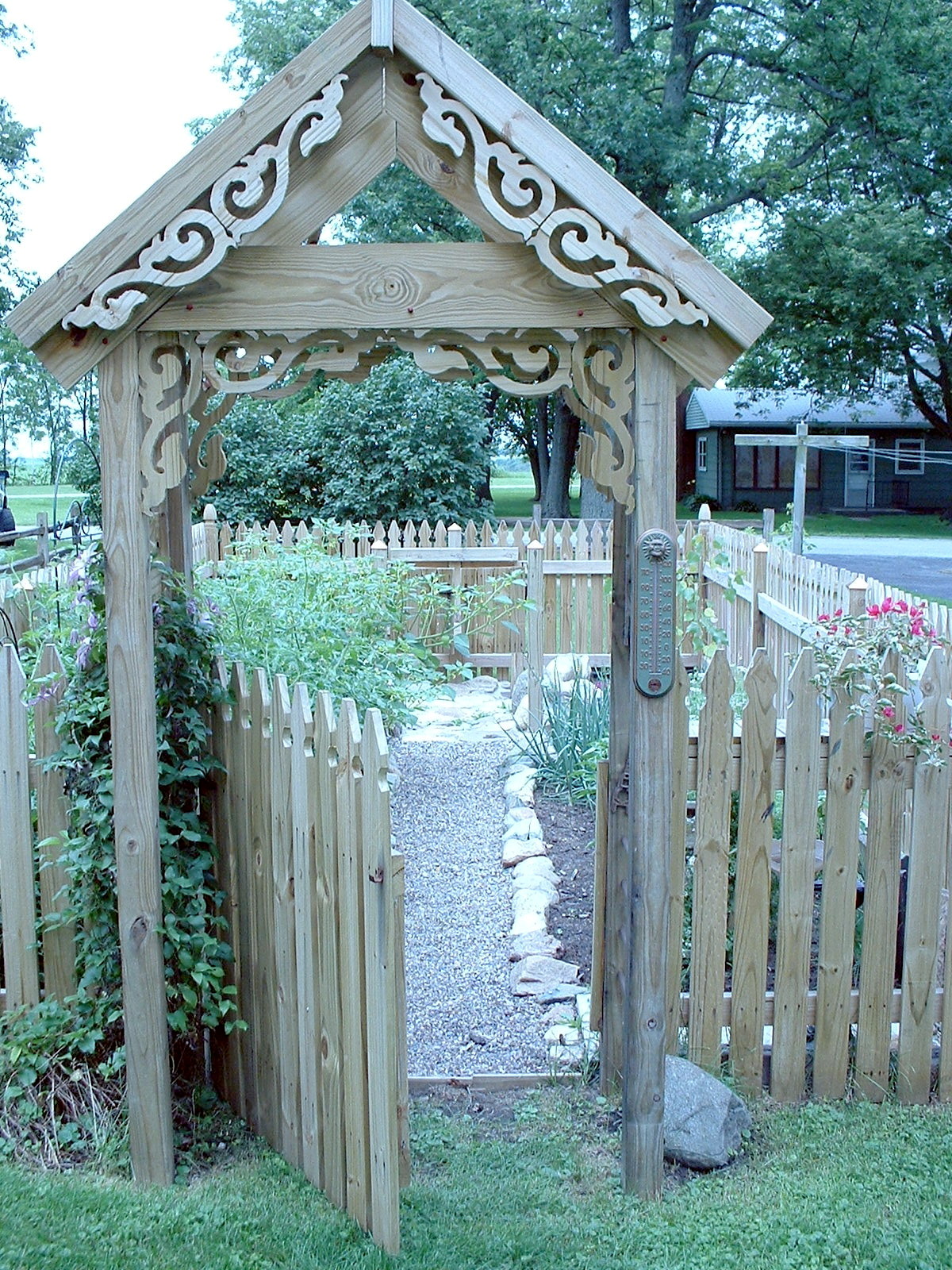 Garden arbor and fencing all cut out by hand designed and built by Neil.JPG