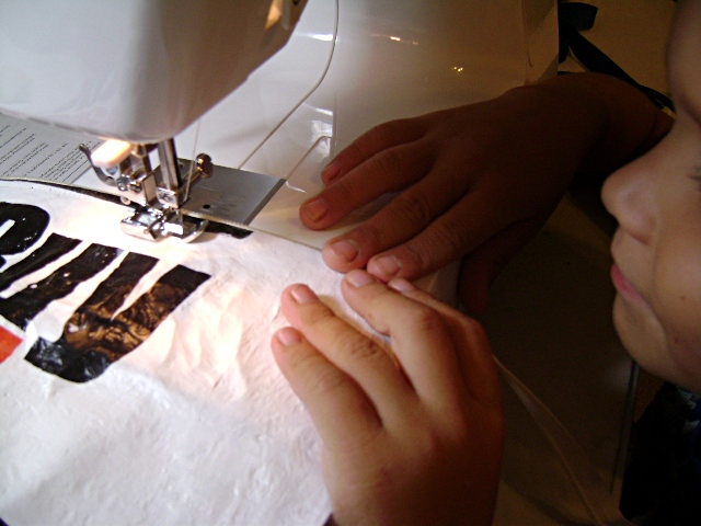 Gavin sewing zipper in bag.JPG