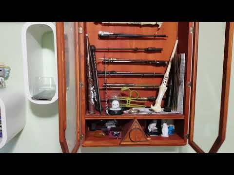 Harry Potter wand cabinet with secret door catch.